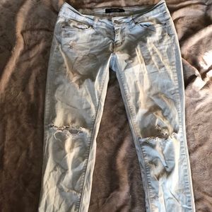 Light wash ripped skinny jeans